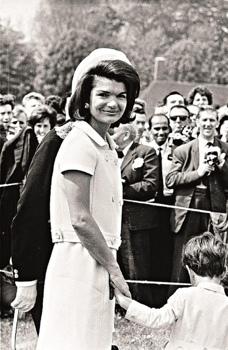 15th May 1965: Jacqueline Kennedy (1929 - 1994) attends the inauguration of a memorial to her husband John F. Kennedy in Runnymede, Surrey, nearly eighteen months after his assassination. Holding her hand is her young son, John F. Kennedy Jr. (1960 - 1999). (Photo by Michael Stroud/Express/Getty Images)